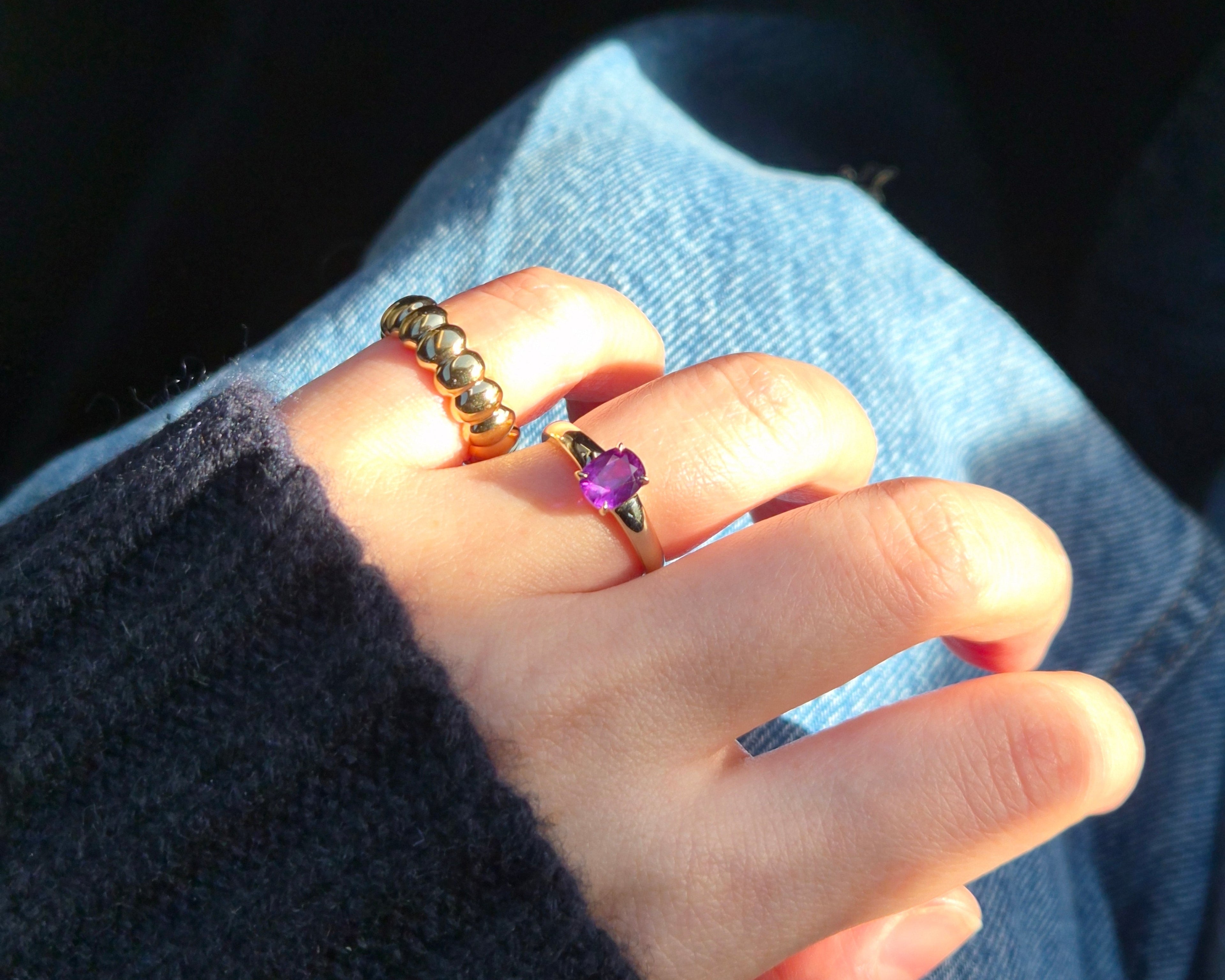 Demonstrating wearing ring and pinky ring